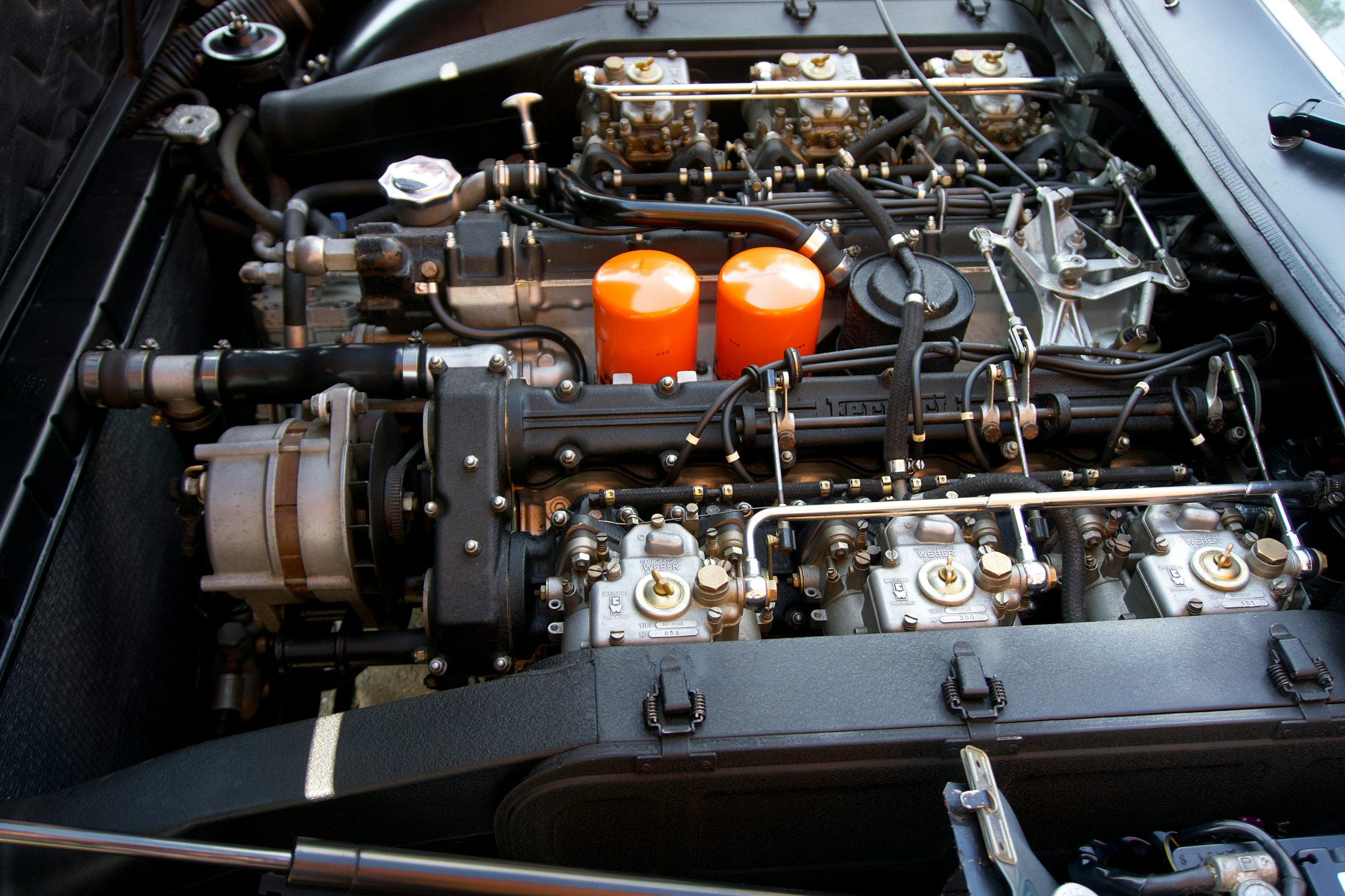 Close-up of an intricate sports car engine showcasing technology and engineering.