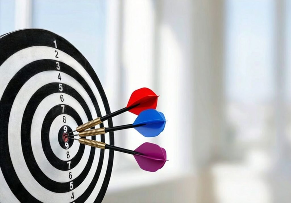 Three arrows hitting the target symbolizing AUTOVA’s three product levels – Pukka, Techno, and Max – offering reliable brake pads and automotive filters with consistent quality standards.